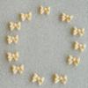 24 Beautiful Edible Sugar Bows. Handmade Birthday, Wedding. Anniversary, Bridal, Baby Shower, Mother's Day, Valentine, Christmas Cake/Cupcake Toppers/Decorations (Cream) view 3