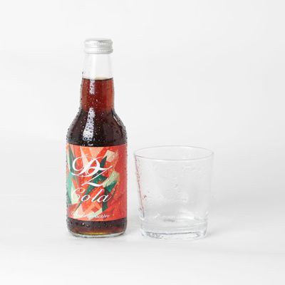 DZ Cola soft drink with vegetable extracts 6 bottles glasses