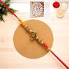 Ghasitaram Gifts Jaiccha Rakhis for Brother Rakhis Online - Y-58 Ganesha Divine Rakhi with 200 GMS of Kaju katli view 1