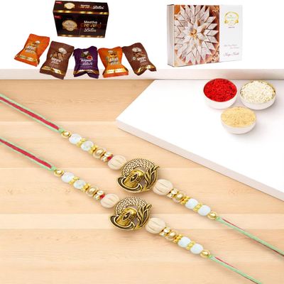 Ghasitaram Gifts Jaiccha Rakhis for Brother Rakhis Online - Set of 2 - X-87 Om Shiv Divine Rakhi with Asorted Bites Box and 200 GMS of Kaju katli