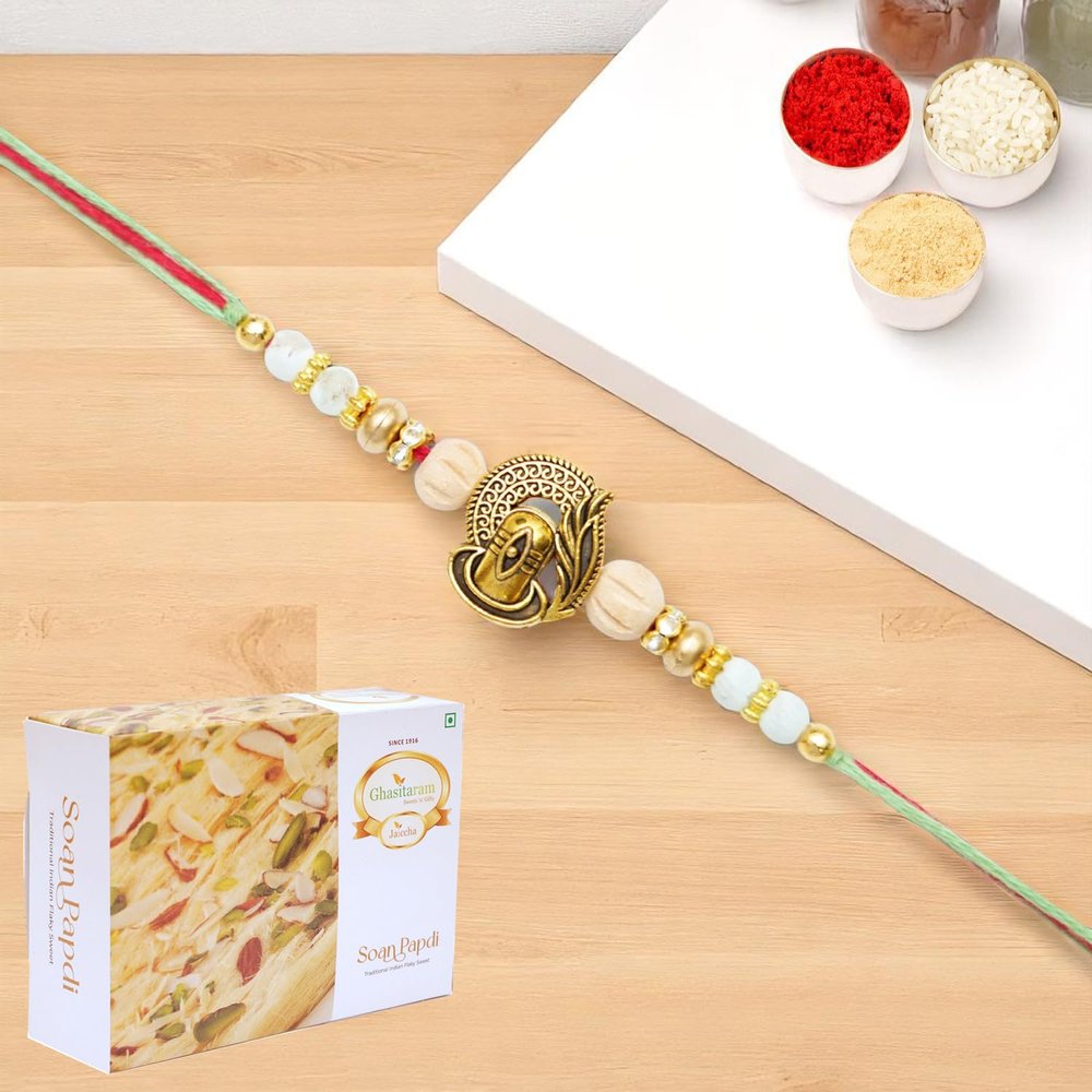 Ghasitaram Gifts Jaiccha Rakhis for Brother Rakhis Online - X-87 Om Shiv Divine Rakhi with 400 GMS of Soan Papdi