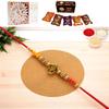 Ghasitaram Gifts Jaiccha Rakhis for Brother Rakhis Online - Y-58 Ganesha Divine Rakhi with Asorted Bites Box and 200 GMS of Kaju katli view 1