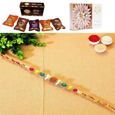 Ghasitaram Gifts Jaiccha Rakhi for Brother Rakhis Online - Y-104 Rudraksh Rakhi with Asorted Bites Box and 200 GMS of Kaju katli
