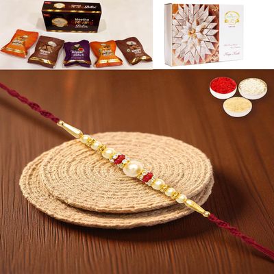 Ghasitaram Gifts Rakhi for Brother Rakhis Online - Y-83 Pearl Rakhi with Asorted Bites Box and 200 GMS of Kaju katli