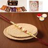 Ghasitaram Gifts Rakhi for Brother Rakhis Online - Y-83 Pearl Rakhi with Asorted Bites Box and 200 GMS of Kaju katli view 1