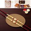Ghasitaram Gifts Rakhi for Brother Rakhis Online - Set of 2 - Y-83 Pearl Rakhi with Asorted Bites Box and 200 GMS of Kaju katli
