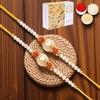 Ghasitaram Gifts Rakhi for Brother Rakhis Online - Set of 2 - Y-34 Pearl Rakhi with 400 GMS of Soan Papdi view 1
