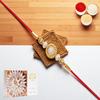 Ghasitaram Gifts Rakhi for Brother Rakhis Online - Y-84 Pearl Rakhi with 400 GMS of Kaju katli