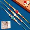 Ghasitaram Gifts Jaiccha Rakhi for Brother Rakhis Online - Set of 3 Pearl rakhis ABC (83, 87, 159) with 200 GMS of Kaju katli view 1