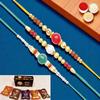 Ghasitaram Gifts Jaiccha Rakhi for Brother Rakhis Online - Set of 3 Pearl rakhis ABC (83, 87, 159) with Asorted Bites Box
