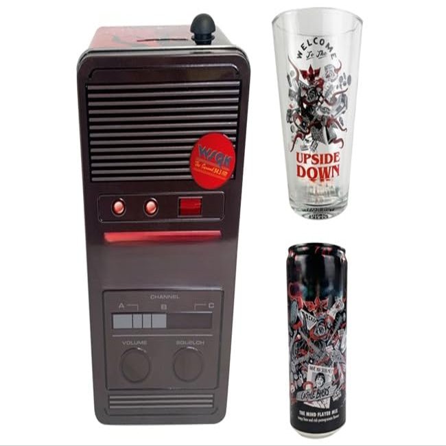 New Walkie Talkie Gift Tin Including A Bottle of Pomegranate, Lime Soft Drink and A Branded Glass and A Collector's Walkie Talkie Tin With Money Box Slot and Antenna Detailing.