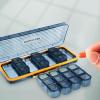 Abaodam Large Capacity Pill Organizer Box with 14 Compartments for Weekly Daily Use and Travel, Portable Reusable Abs Medicine Holder with Morning and Evening Reminder view 3