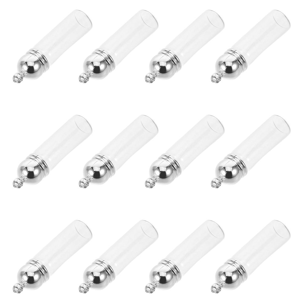 HAMPPLIES Aromatherapy Oil Pendants and Easy Access Lightweight Mini Glass Bottle Charms 12pcs with Silver Zinc Alloy Caps 35x11mm Vial for Daily Outings and Christmas Jewelry Making