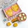 Pre-Order Now For Delivery From 12th March, The Large Heart & Tea Box With Cream Tea for 4, 2 Large Heart Shaped Mum Pasties, 4 Flower Shaped Scones, 1 Clotted Cream, 4 Jam and 4 Tea view 1