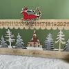 NVOQILIN LED Lighted Wood Advents Calendar Carved Wood Christmas Scene Countdowns Calendar with LED Lights and Tree House Christmas Tree Decoration view 3