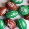 Foil Wrapped Chocolate Flavoured Rugby Balls, Brown and Green, Pack of 50 view 1